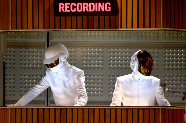 LOS ANGELES, CA - JANUARY 26: Recording artists Thomas Bangalter (L) and Guy-Manuel de Homem-Christo of Daft Punk perform onstage during the 56th GRAMMY Awards at Staples Center on January 26, 2014 in Los Angeles, California. (Photo by Kevin Winter/WireImage)